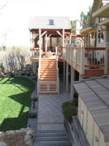 Colorado backyard with Deck, Steps, and Pavers