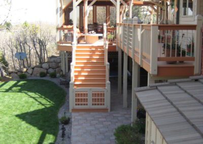 Colorado backyard with Deck, Steps, and Pavers
